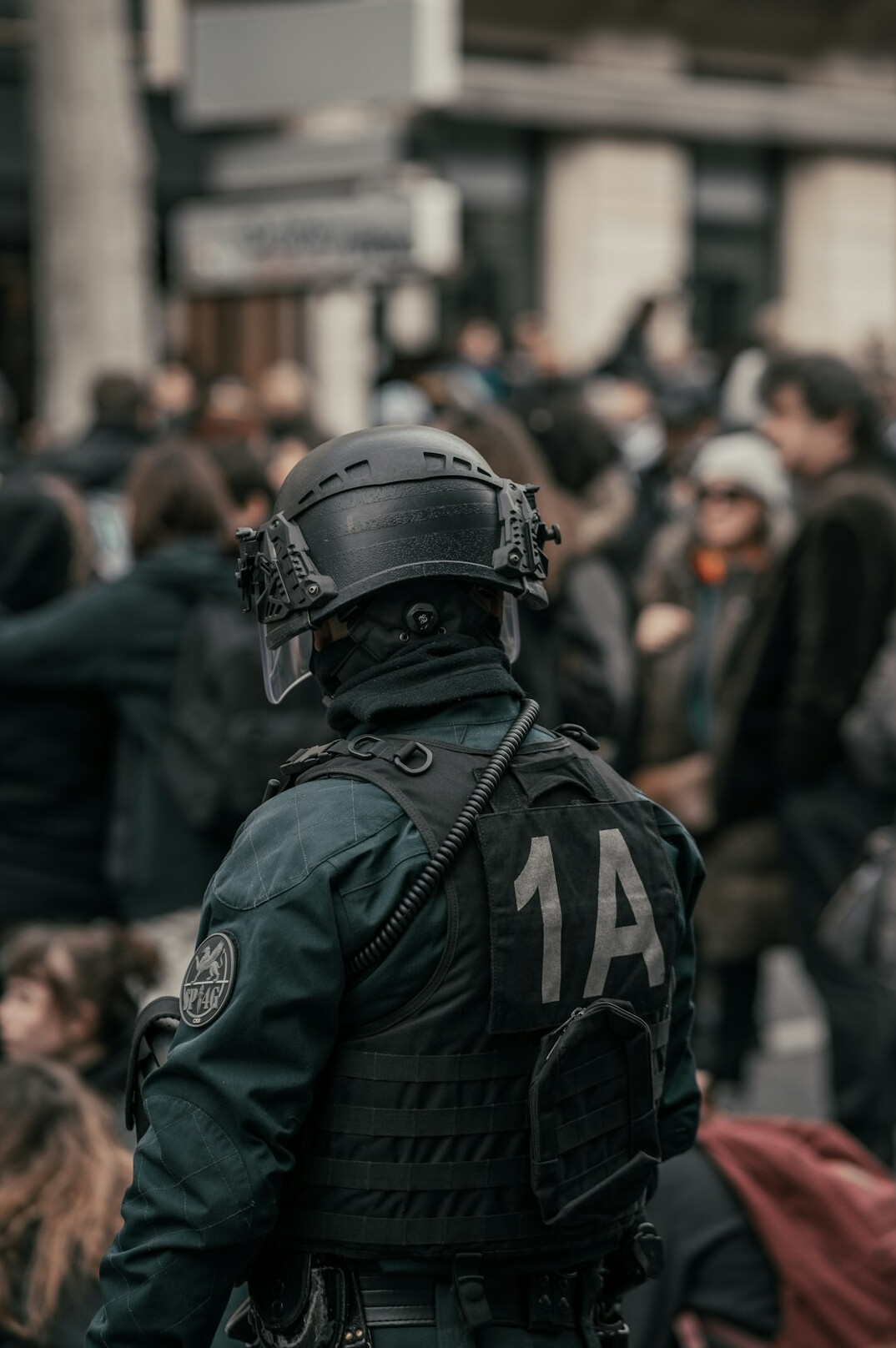 security guard watching crowd