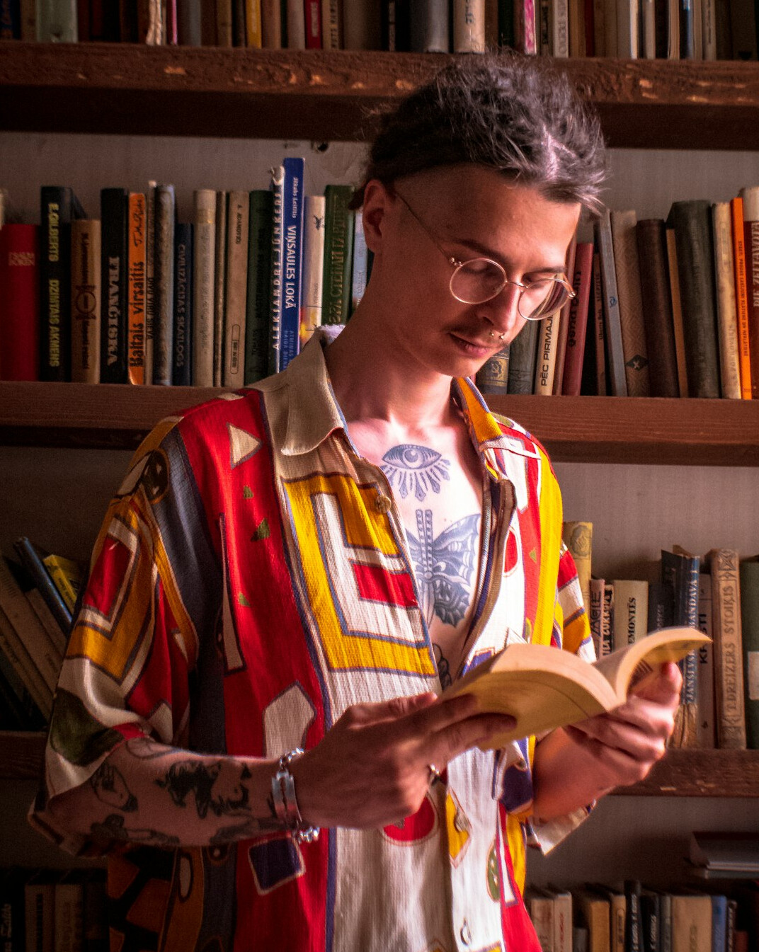 Portrait of a man archivist and book reviewer with glasses