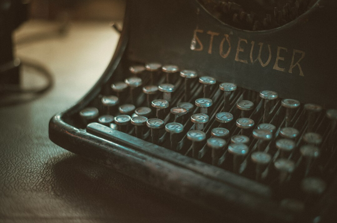 Vintage typewriter with a sheet of paper
