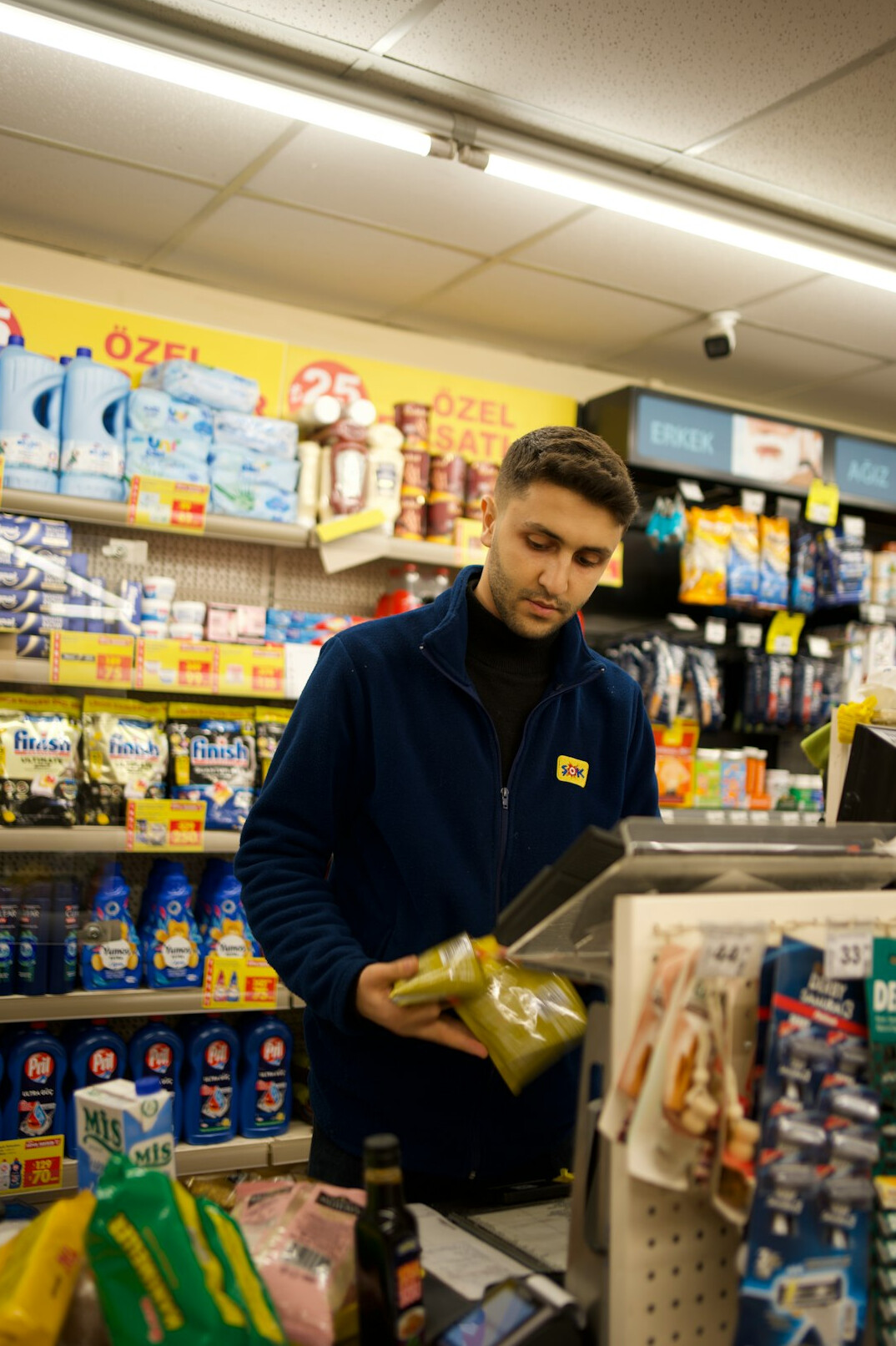 store detective watching customers
