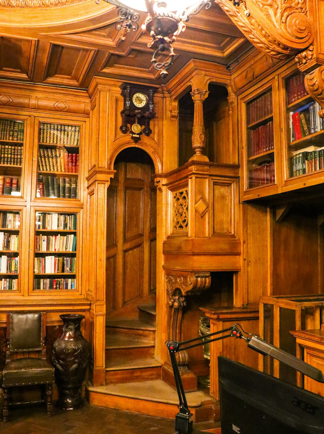 Grand historic library with tall wooden bookshelves